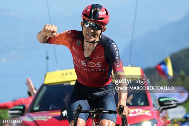 Grenadiers' Polish rider Michal Kwiatkowski cycles to the finish line to win the 13th stage of the 110th edition of the Tour de France cycling race,...