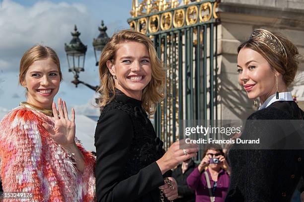 Elena Perminova, Natalia Vodianova and Ulyana Sergeenko arrive at the Valentino Spring / Summer 2013 show as part of Paris Fashion Week at Espace...