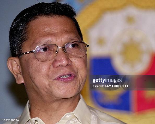 Angelo Reyes Death Philippine Defence secretary Angelo Reyes briefs reporters in Manila ...