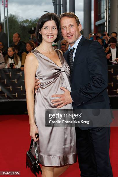 Wotan Wilke Möhring and Anna Theis attend the German TV Awards 2012 at Coloneum on October 2, 2012 in Cologne, Germany.