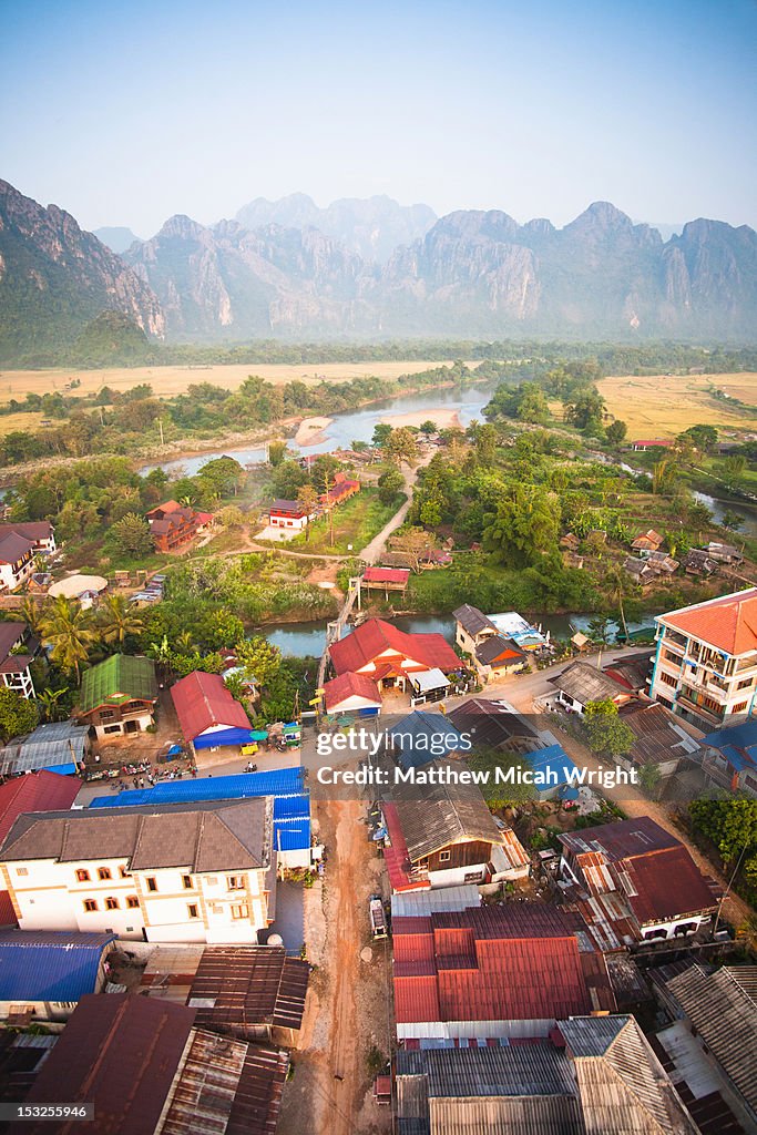 Aerial views over the city of Vang Vieng.