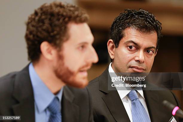 Jamil Nazarali, president of execution services with Citadel LLC, right, looks on as David Lauer, market structure and high-frequency trading...