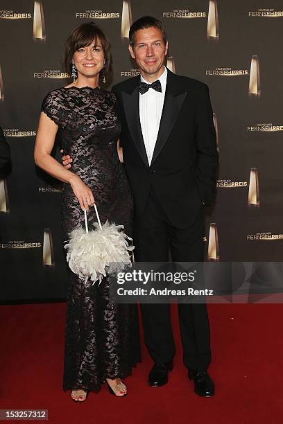 Maybrit Illner and Rene Obermann arrive for the German TV Award 2012 at Coloneum on October 2, 2012 in Cologne, Germany.