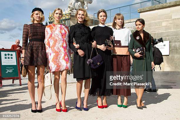 Elena Perminova , Natalia Vodianova and Ulyana Sergeenko arrive to attend the Valentino Spring / Summer 2013 show as part of Paris Fashion Week at...