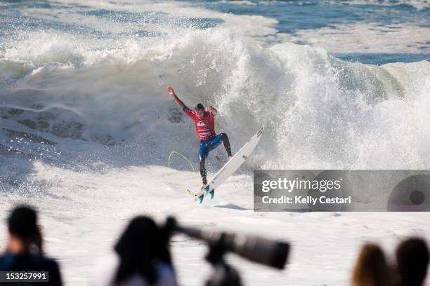 Joel Parkinson of Australia explodes out of the barrel during Round 2 of the Quiksilver Pro France on October 2, 2012 in Hossegor, France.