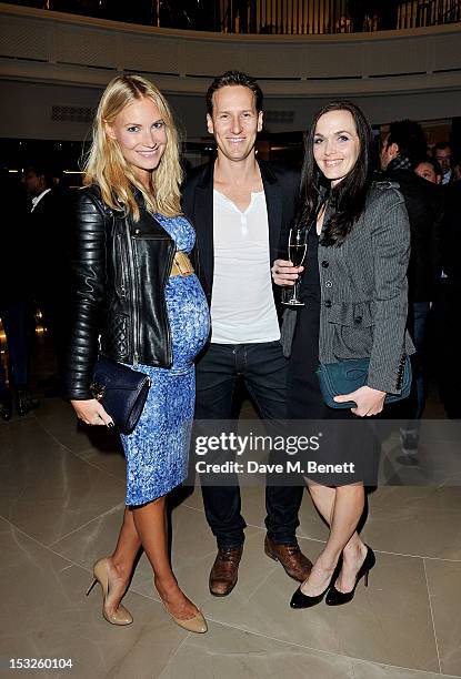 Zoe Cole, Brendan Cole and Victoria Pendleton attend as Burberry celebrates The Britain at Burberry Regent Street on October 2, 2012 in London,...