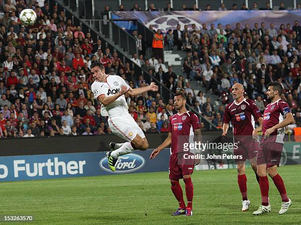 Robin van Persie of Manchester United scores their first goal during the UEFA Champions League Group H match between CFR 1907 Cluj and Manchester...