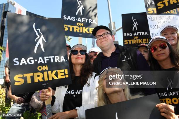 President Fran Drescher , with National Executive Director & Chief Negotiator, Duncan Crabtree-Ireland and actress Frances Fisher , joins Writers...