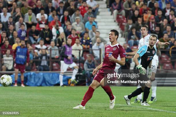 Robin van Persie of Manchester United scores their second goal during the UEFA Champions League Group H match between CFR 1907 Cluj and Manchester...