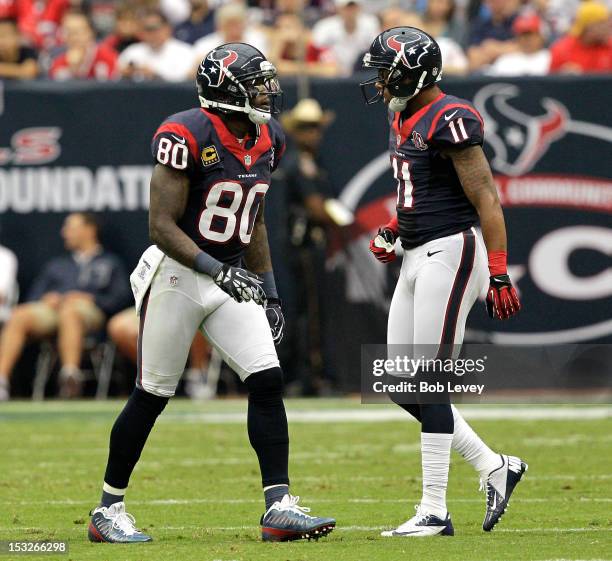 Andre Johnson of the Houston Texans and DeVier Posey of the Houston Texans during action against the Tennessee Titans at Reliant Arena at Reliant...