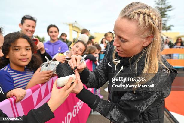 Betsy Hassett of the New Zealand Football Ferns signs autographs during a New Zealand Football Ferns Fan Event at Napier Soundshell at on July 11,...