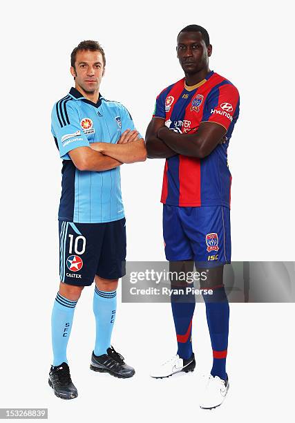 Alessandro Del Piero of Sydney FC and Emile Heskey of Newcastle Jets pose during a 2012/13 A-League player portrait session at Parramatta Stadium on...