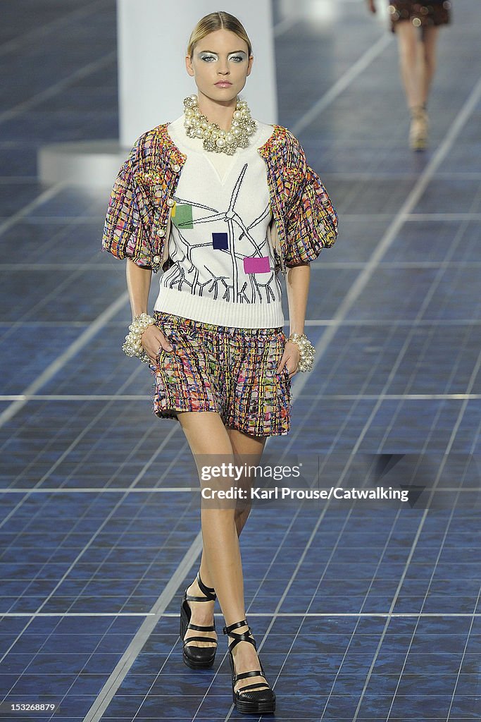 Chanel Spring 2013 A model walks the runway at the Chanel Spring Summer 2013 fashion ...
