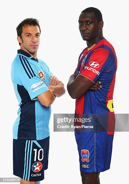 Alessandro Del Piero of Sydney FC and Emile Heskey of Newcastle Jets pose during a 2012/13 A-League player portrait session at Parramatta Stadium on...