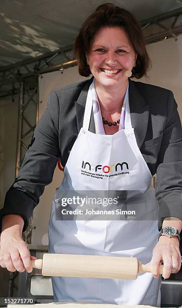 German Agriculture and Consumer Protection Minister Ilse Aigner samples regional food at the "Geschmackstage" 2012 regional food promotional event at...