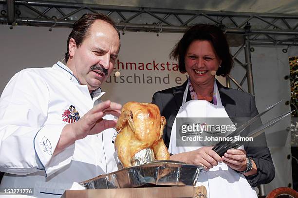 German Agriculture and Consumer Protection Minister Ilse Aigner and chef Johann Lafer samples regional food at the "Geschmackstage" 2012 regional...