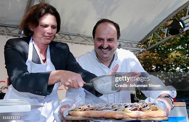 German Agriculture and Consumer Protection Minister Ilse Aigner and chef Johann Lafer samples regional food at the "Geschmackstage" 2012 regional...