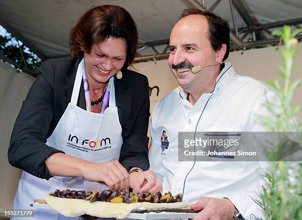 German Agriculture and Consumer Protection Minister Ilse Aigner and chef Johann Lafer sample regional food at the "Geschmackstage" 2012 regional food...