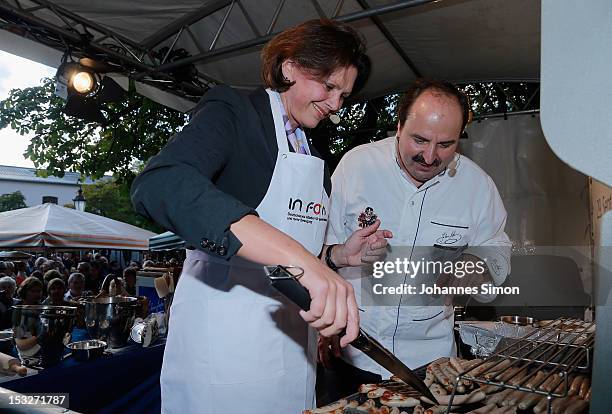 German Agriculture and Consumer Protection Minister Ilse Aigner and chef Johann Lafer samples regional food at the "Geschmackstage" 2012 regional...