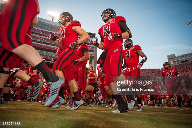 The Nebraska Cornhuskers take the field before their game against the Wisconsin Badgers at Memorial Stadium on September 29, 2012 in Lincoln,...