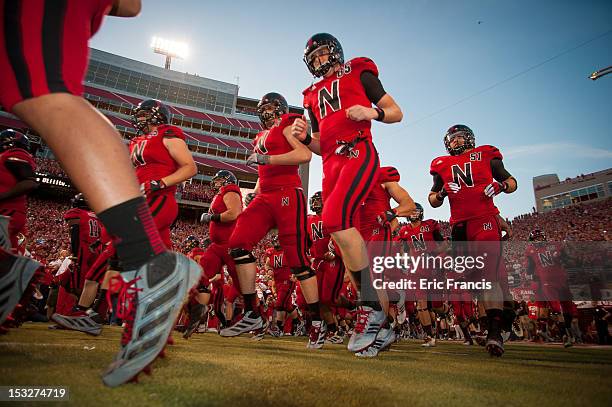 The Nebraska Cornhuskers take the field before their game against the Wisconsin Badgers at Memorial Stadium on September 29, 2012 in Lincoln,...