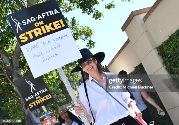 Allison Janney joins SAG-AFTRA and WGA Members and Supporters as they walk the picket line in support of the SAG-AFTRA and WGA strike on Day 2 at the...