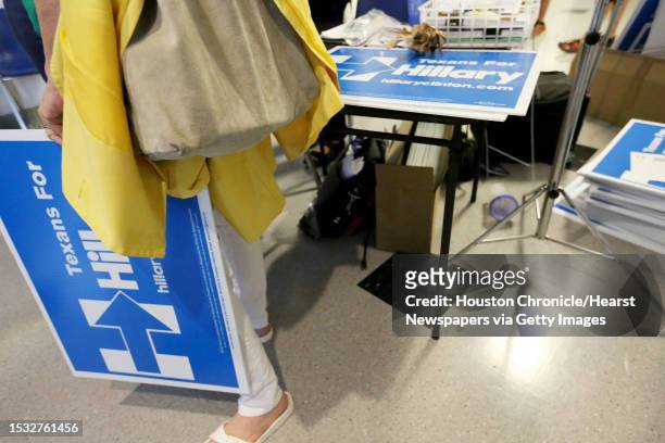 Signs are prepared for Hillary Clinton supporters to purchase at the grand opening of a Democratic National Committee headquarters at the Dorothy...