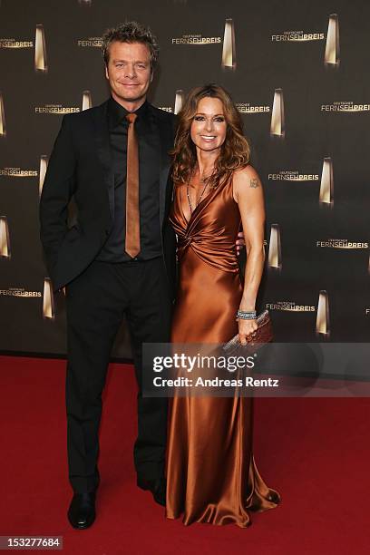 Christina Plate and Oliver Geissen arrive for the German TV Award 2012 at Coloneum on October 2, 2012 in Cologne, Germany.