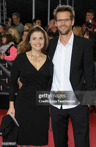 Katharina Wackernagel and Jonas Grosch arrive for the German TV Award 2012 at the Coloneum on October 2, 2012 in Cologne, Germany.