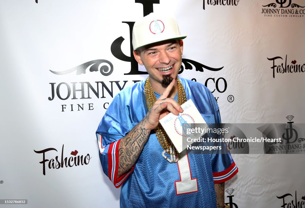 Houston Rapper Pcp Rapper Paul Wall poses for a photo at the grand opening of his grillz ...