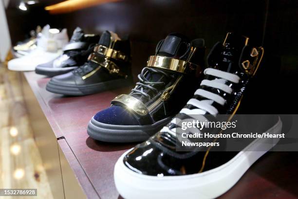 Designed special shoes are sold at Paul Wall's grillz store, Johnny Dang & Co., Saturday, Oct. 22 in Houston.