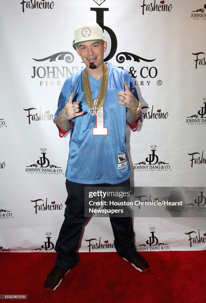 Houston Rapper Pcp Rapper Paul Wall poses for a photo at the grand opening of his grillz ...