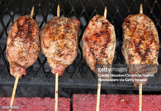 Steak Out's Prok Chop On A Stick is one of the new food at the Houston Livestock Show and Rodeo Wednesday, March 8 in Houston.