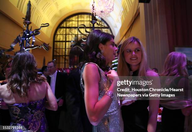 Reese Lasher, left, and Alice Delahunt have a conversation at Houston Grand Opera Ball 2017, Carnevale di Venezia at Wortham Theater Center Saturday,...