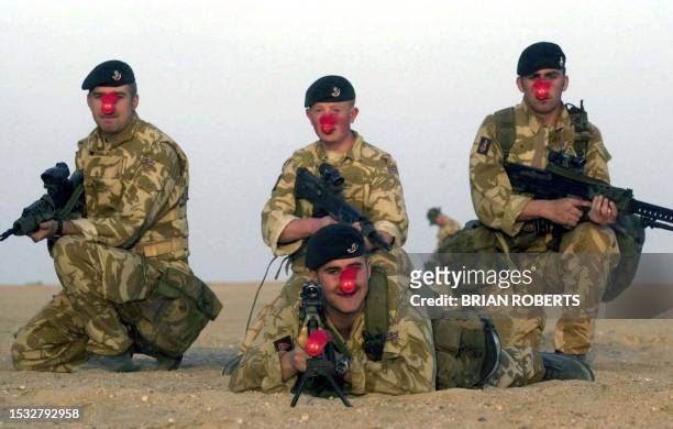 Members of The British Kings Own Light Infantry attached to 2nd Royal Tank regiment in Kuwait, from L-R in rear Liam Cormish from Liverpool, Paul...