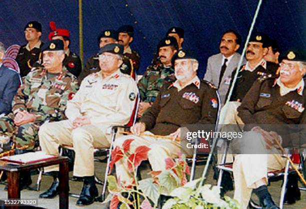 Pakistani President General Pervez Musharraf along with other military officials attend the handing over ceremony of the Ghauri missile, with a range...