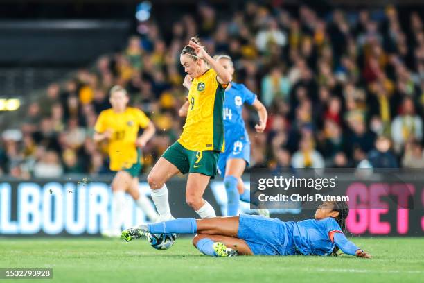 Caitlin Foord of Australia and Wendie Renard of France compete for the ball as Australia plays France in the World Cup 2023 Send Off friendly match.