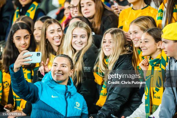 Steph Catley of Australia with fans post match after beating France in the World Cup 2023 Send Off friendly match.