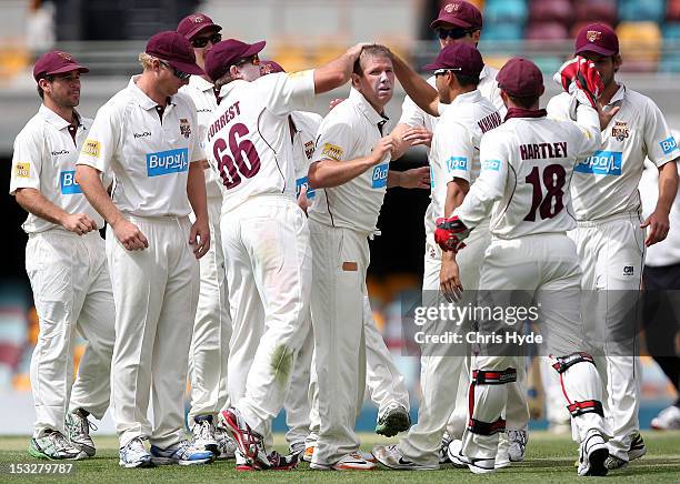 James Hopes of the Bulls celebrates with team mates after dismissing Chadd Sayers of the Redbacks during day three of the Sheffield Shield match...