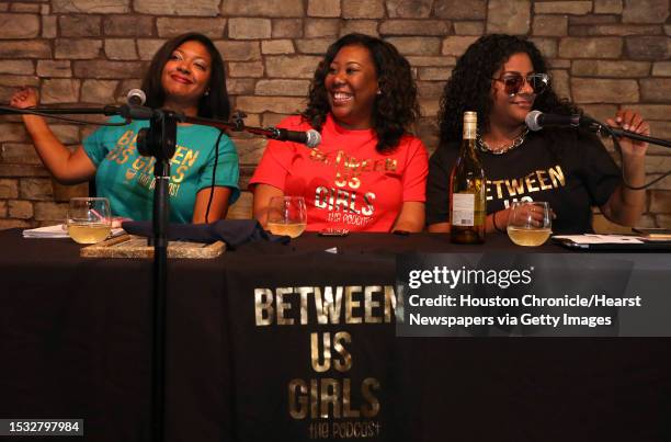 The Between Us Girls podcast co-hosts Michel Roy, from left, Danielle Jones and Sharonda Foster grooving with fans before recording a special live...
