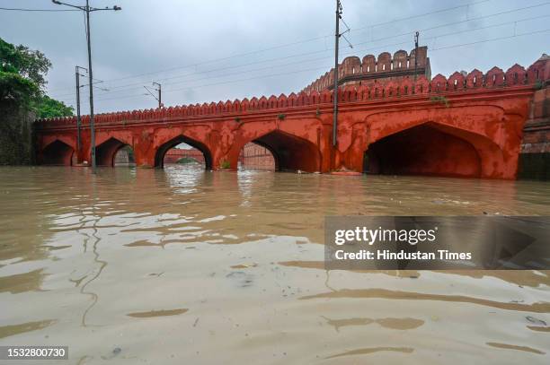 View of the flooded road near Salimgarh Fort after a rise in the level of Yamuna River following the Monsoon rains on July 14, 2023 in New Delhi,...