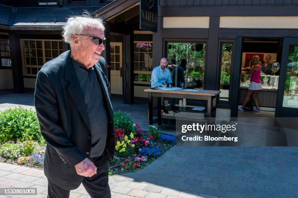 Phil Knight, chairman emeritus and co-founder of Nike Inc., walks the grounds during the Allen & Co. Media and Technology Conference in Sun Valley,...