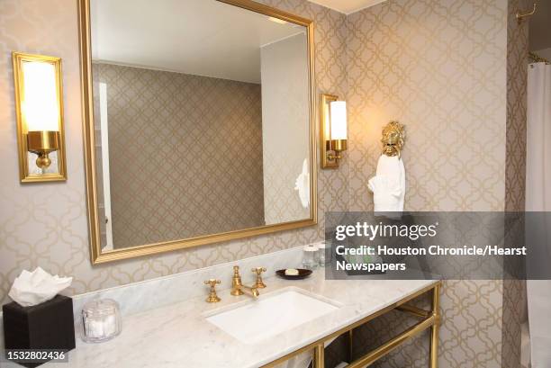 Lancaster Hotel unvails new designs of one of the 93 hotel rooms during a press tour on Thursday, Oct. 11 in Houston. The hotel flooded during...