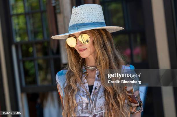 Stacey Bendet Eisner, chief executive officer of Alice + Olivia LLC, walks the grounds during the Allen & Co. Media and Technology Conference in Sun...