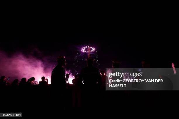 Fireworks explode around the Eiffel Tower as part of the annual Bastille Day celebrations in Paris, on July 14, 2023.