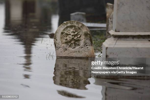 Evergreen Cemetery on Broadway is flooded and some headstones are under water after hours of rain on Wednesday, Sept. 18 in Galveston.