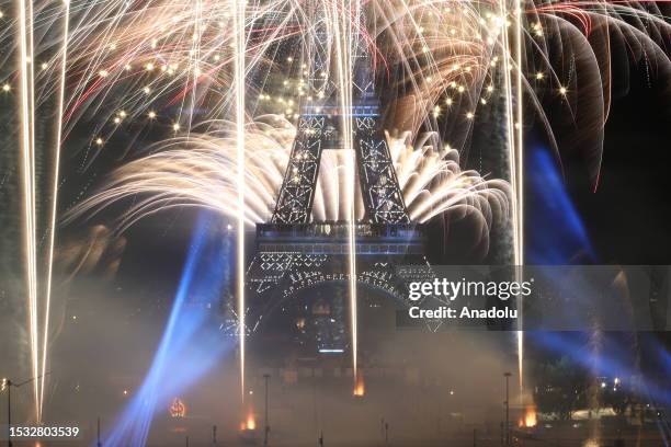 Fireworks explode above the Eiffel Tower as part of the annual Bastille Day celebrations in Paris, France on July 14, 2023.