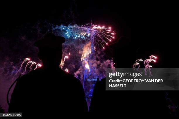 Fireworks explode near the Eiffel Tower as part of the annual Bastille Day celebrations in Paris, on July 14, 2023.