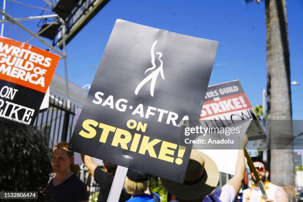 Actors in the SAG-AFTRA union join the already striking WGA union, film and tv writers on the picket line, on Day 3 of a SAG-AFTRA strike, in Los...