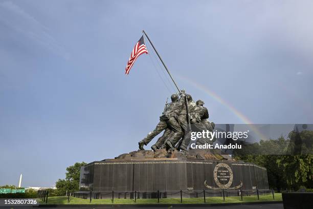 Rainbow appears over US Marine Corps War Memorial in Washington, USA on July 14, 2023.